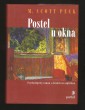 Postel u okna